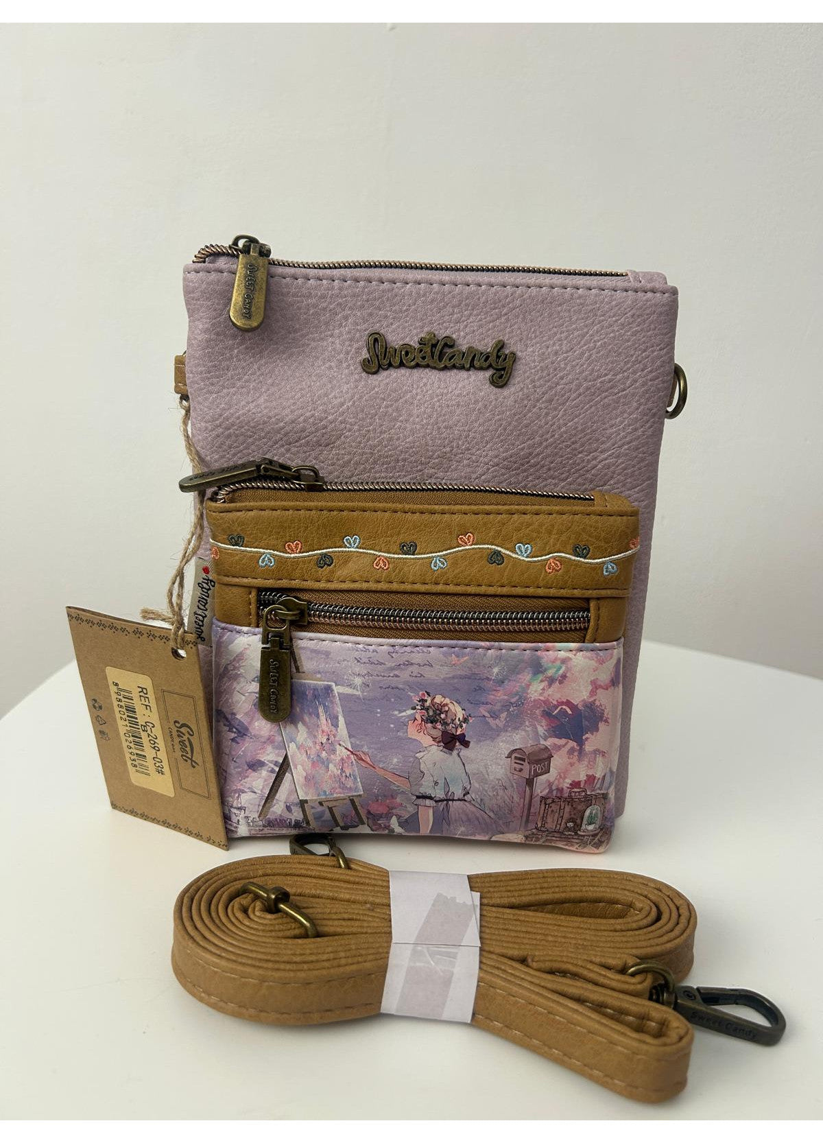 Geanta crossbody cu 2 buzunare frontale cu fermoar.